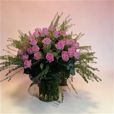 50 pink roses in a vase