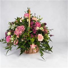 Soft pink garden basket arrangement Small